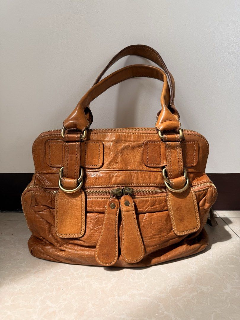 Vintage Chloe Bay Bag (Original) (Category: Shoulder Bags) located in Pasig City. Submitted by uncannyxgirl (Listing ID 1470027218, Image 2). Description: - Rubber lining intact - Hardwares intact - Real Leather - All zippers working 📍Ortigas, Pasig / Robinsons Magnolia.