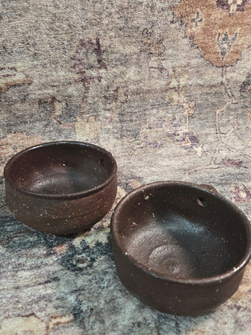 Vintage dark glazed studio chawan matcha bowl (per piece) (Category: Coffee & Tea Tableware) located in Manila. Submitted by cwknds (Listing ID 1470055411, Image 2). Description: sculpted from heavy iron-rich clay with a deep chocolate wash, side pour lip, and organic speckled texture. (chasen shown for scale comparison only) • vintage unused • ₱450/each ~ personally sourced&curated note: these are vintage pieces hence may show signs of age and w