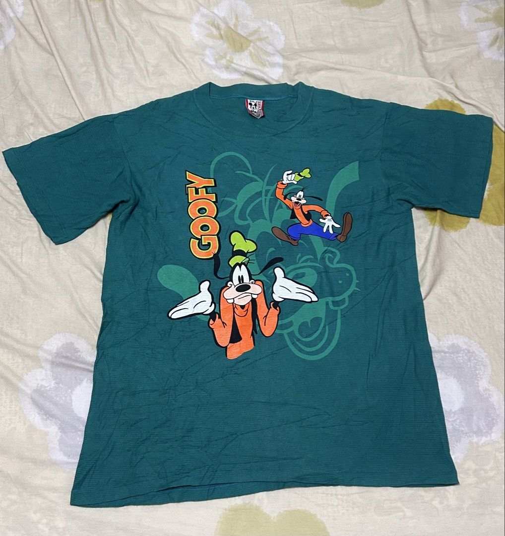 Vintage Disney Goofy Tee (Category: Activewear) located in Jordan. Submitted by pareng_j0mar (Listing ID 1469952555, Image 1). Description: Vintage Disney Goofy Tee Made in USA Single Stitch Small/Medium Width 23 Length 29 .