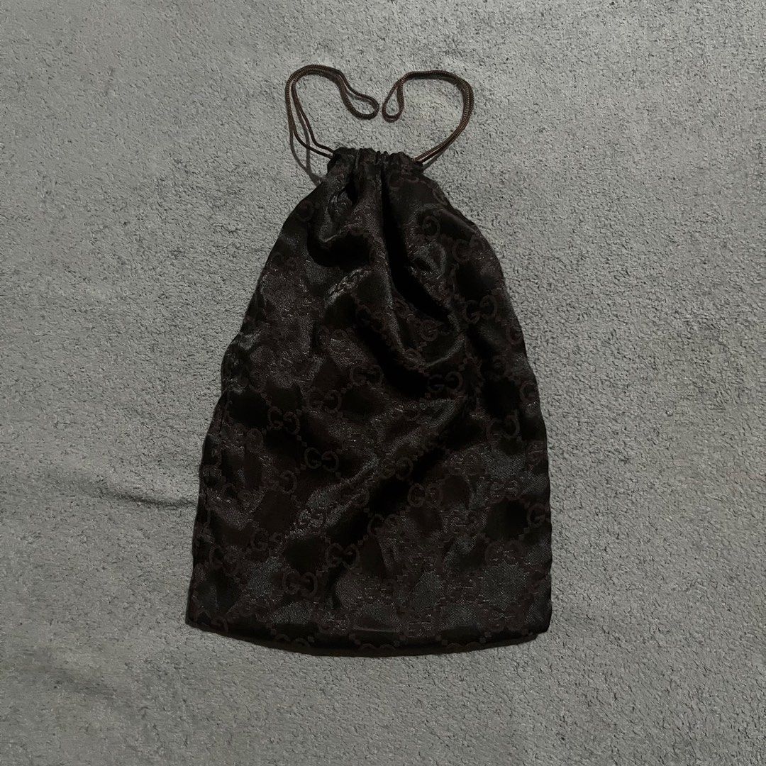 Vintage Gucci brown monogram GG satin drawstring dust bag (Category: Luxury Bags & Wallets) located in Hagonoy. Submitted by ianthrift_ph (Listing ID 1470094765, Image 1). Description: pristine condition color 10/10 no issue.