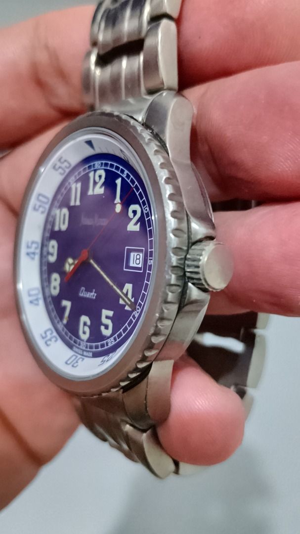 Vintage Neiman Marcus Swiss Titanium Watch (Category: Men's Watches) located in Malolos. Submitted by chrono_revival (Listing ID 1470050857, Image 2). Description: PLEASE READ THE FULL POST BEFORE SENDING ANY INQUIRIES. SERIOUS OFFERS ONLY PLEASE. ********** Authentic Neiman Marcus Model-002 - Men’s Swiss Quartz Watch - Titanium-made, light-weight and durable - Blue and White dial - Rotating inner bezel - Case size: approx. 40mm - Lug size: appro