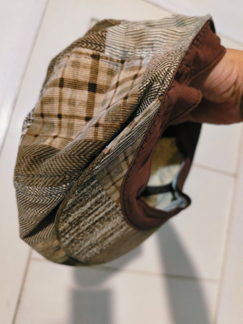 Vintage Patchwork Flat Cap Brown Newsboy Hat (Category: Caps & Hats) located in Bulacan. Submitted by babz30261 (Listing ID 1470038321, Image 3). Description: - Style: Classic newsboy flat cap - Material: Mixed tweed and corduroy patchwork - Color: Earthy brown tones - Features: Structured brim and smooth inner lining - Fit: Standard adult head size - Season: Ideal autumn accessory.
