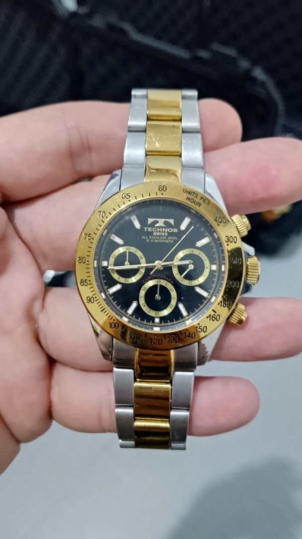 Vintage Technos Chronograph Watch Two-tone (Category: Men's Watches) located in Malolos. Submitted by chrono_revival (Listing ID 1470050176, Image 1). Description: PLEASE READ THE FULL POST BEFORE SENDING ANY INQUIRIES. SERIOUS OFFERS ONLY PLEASE. ********** Authentic Technos TGM-615 - Men’s Swiss Watch Diver’s Chronograph - Black dial with gold sub-dials - Non-rotating gold bezel - Screw-down crown - Original signature two-tone bracelet - Case s