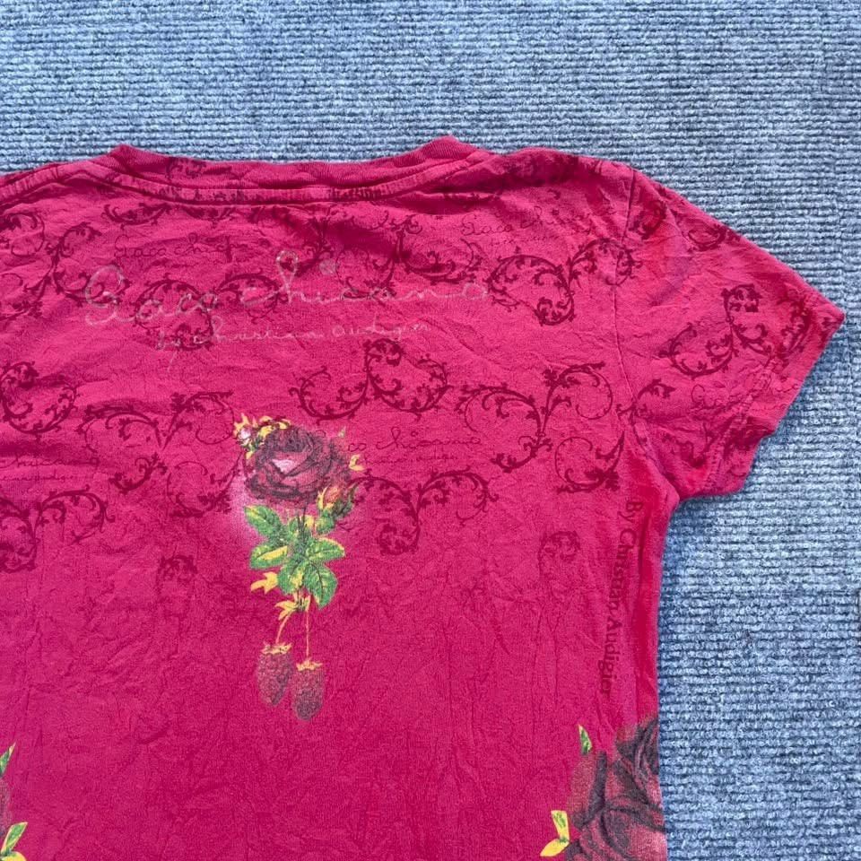 Vintage y2k christian audigier (Category: Luxury Apparel) located in Iloilo. Submitted by 3ift2heav3n (Listing ID 1469960816, Image 3). Description: vintage Y2K Christian Audigier dark red/magenta graphic V-neck/scoop-neck T-shirt featuring rose and strawberry graphics with Chicano-style lettering. Authentic Small Excellent condition No flaw's .