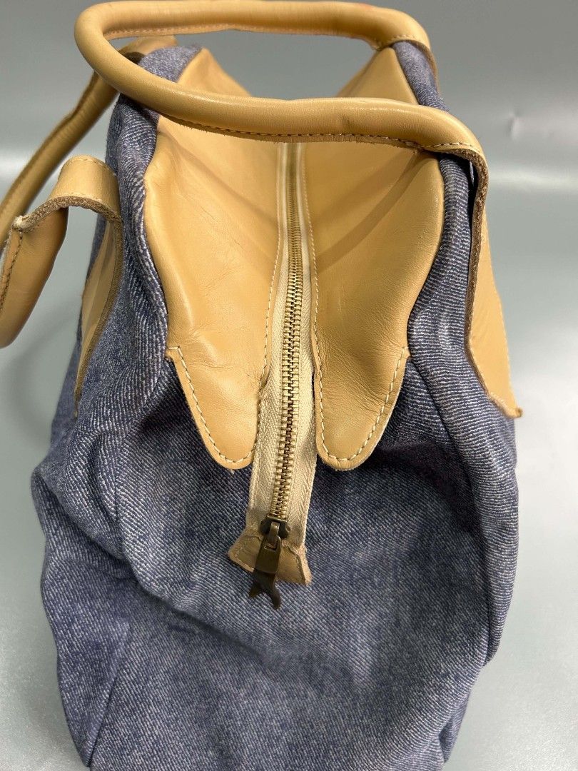 Vivienne westwood denim bag (Category: Luxury Bags & Wallets) located in Santa Rosa. Submitted by _ba_mo_si_ (Listing ID 1470078379, Image 3). Description: Bag only Plus sf Dm.