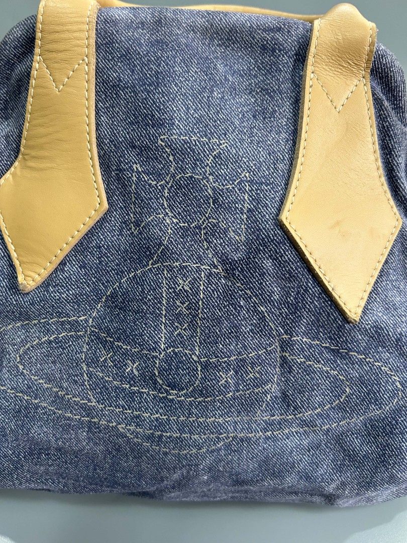 Vivienne westwood denim bag (Category: Luxury Bags & Wallets) located in Santa Rosa. Submitted by _ba_mo_si_ (Listing ID 1470078379, Image 2). Description: Bag only Plus sf Dm.