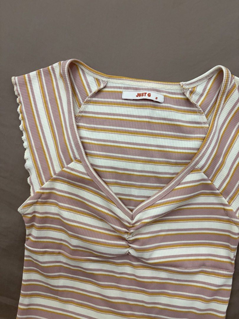 V-Neck Top (Category: Shirts) located in Pasig City. Submitted by gdeclutterwithme (Listing ID 1470124193, Image 2). Description: - Brand: Just G - Size: Small - Material: Soft ribbed fabric very cute!! dm for more deets and for when worn pics if you want !! 💕.