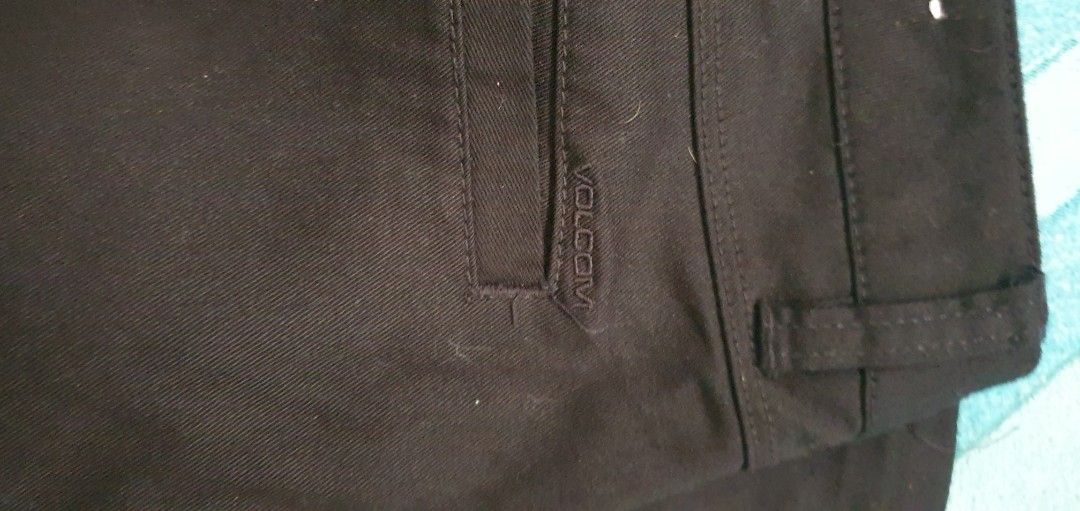Volcom Since Nineteen Ninety-One Black Pants (Category: Jeans) located in Manila. Submitted by koneho311 (Listing ID 1470033930, Image 3). Description: - Brand: Volcom - Color: Black - Material: Structured cotton-blend with slight stretch - Fit: Comfortable tailored fit for daily wear - Details: Subtle embroidered stone logo on leg and back pocket - Features: Standard belt loops and zip fly closure - Origin: Made in China.