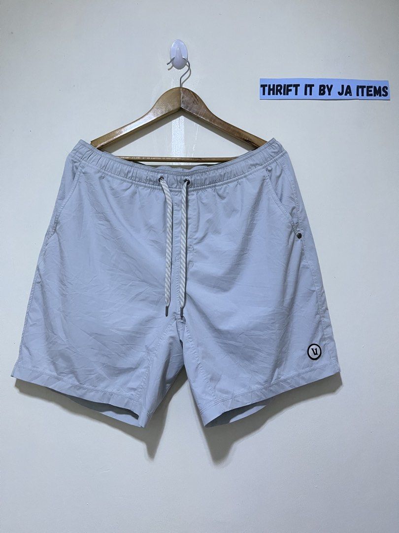 Vuori Light Blue Performance Boardshorts (Category: Swim Trunks & Board Shorts) located in Baguio. Submitted by jaitems22 (Listing ID 1470070370, Image 2). Description: - Brand: Vuori - Color: Light blue - Condition: Excellent / Great versatile option - Waistband: Elastic with patterned drawstring cords - Pockets: Front slash pockets and one back flap pocket with logo tag - Details: Circle V logo patch near the hem - Ideal for: Swimming or casual