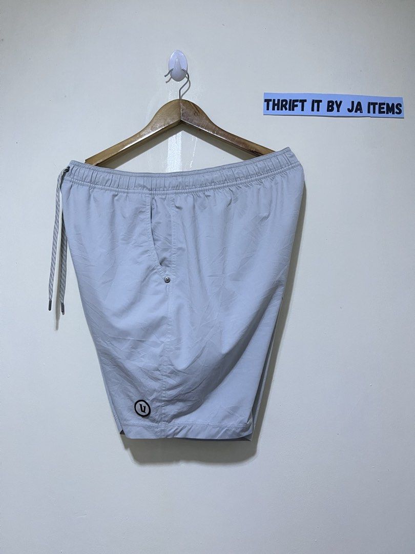 Vuori Light Blue Performance Boardshorts (Category: Swim Trunks & Board Shorts) located in Baguio. Submitted by jaitems22 (Listing ID 1470070370, Image 3). Description: - Brand: Vuori - Color: Light blue - Condition: Excellent / Great versatile option - Waistband: Elastic with patterned drawstring cords - Pockets: Front slash pockets and one back flap pocket with logo tag - Details: Circle V logo patch near the hem - Ideal for: Swimming or casual