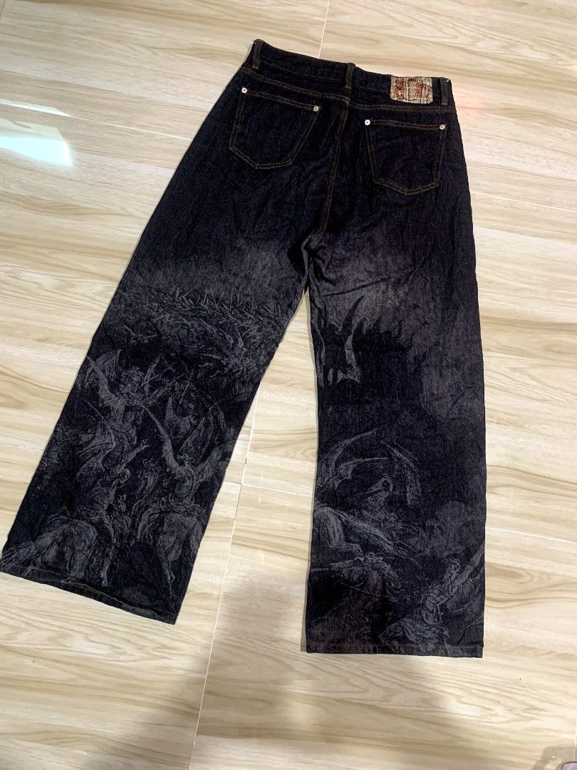 Wanna lab AOP pants (Category: Jeans) located in Manila. Submitted by thegoodstuffs__ (Listing ID 1470138877, Image 2). Description: - Color & Wash: Dark grey wash denim - Design: All-over Renaissance style angel and figure graphic print - Fit: Trendy wide leg fit - Details: Classic five-pocket styling, button fly, and belt loops - Material: Heavyweight, durable fabric - Style: Unique streetwear statement piece Size: 32width 41Length.