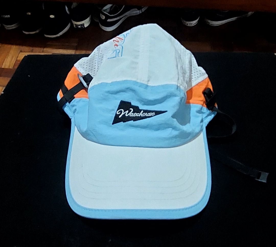 Wasc House Surfing Nylon Cap (Category: Caps & Hats) located in Legazpi City. Submitted by street_uniform (Listing ID 1470029214, Image 1). Description: - Brand/Model: Wasc House Surfing nylon cap - Colorway: White, light blue, and orange - Material: 100% nylon - Size: Free size (adjustable back strap) - Details: Side mesh panels, front embroidered logo, and printed side lettering - Condition: Clean inside and out, ready to wear.