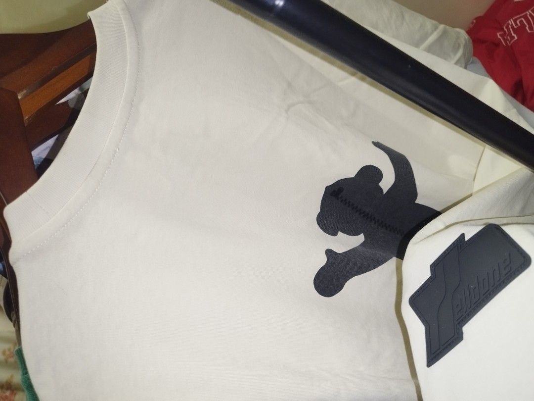 We11done Cream Bear Graphic Tee (authentic) (Category: Tshirts & Polo Shirts ) located in Tuguegarao City. Submitted by ZeevLim (Listing ID 1470035119, Image 3). Description: - Brand: We11done - Color: Cream - Size: Relaxed fit 22w 29.5l - Material: Soft premium cotton (Made in Korea) - Design details: Large black bear graphic print on front and back - Unique feature: Zipper detail down the spine and branded rubber patch on the sleeve - Mode of t