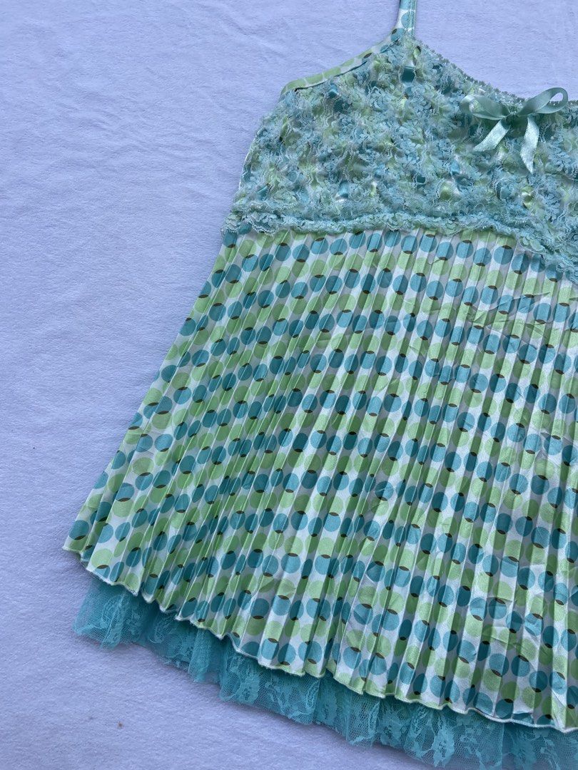 Whimsical Polkadot Cami Tops (Category: Blouses) located in General Santos City (Dadiangas). Submitted by kala_chuchi (Listing ID 1470114899, Image 3). Description: Size. Small 14 inches width 25 inches length No flaws Over all condition Excellent .