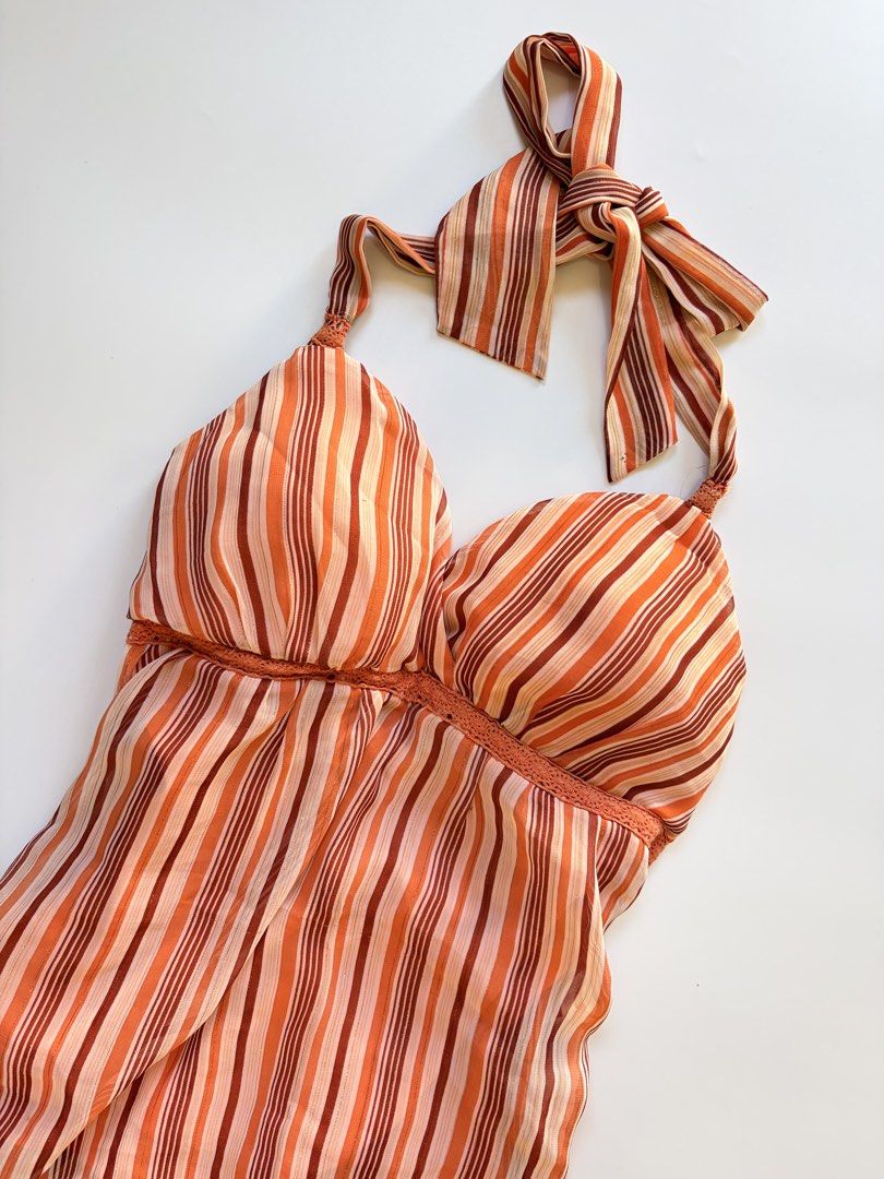 whimsy assymetrical padded orange halter top (Category: Sleeveless) located in Tarlac. Submitted by pearl_xoxo (Listing ID 1470108535, Image 2). Description: - whimsy assymetrical padded orange halter top bust: 15-19” waist: 24” length: 23” size: m-large issue: needwash brand: jordache .
