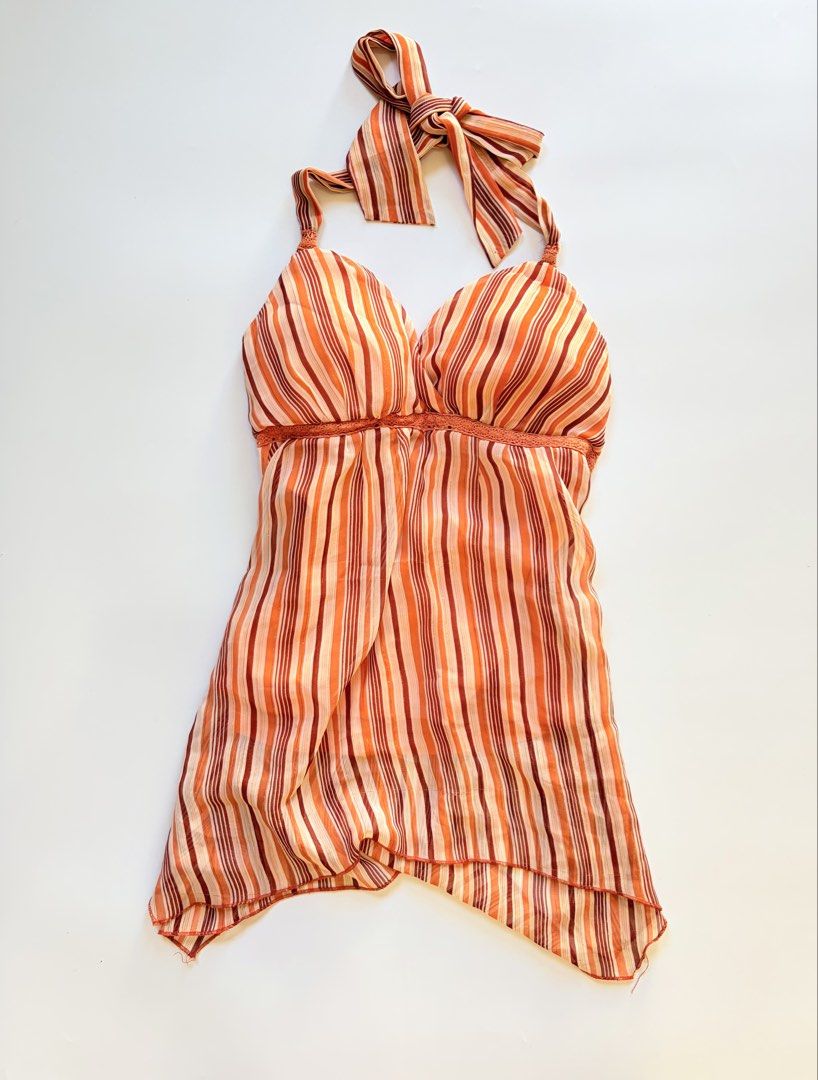 whimsy assymetrical padded orange halter top (Category: Sleeveless) located in Tarlac. Submitted by pearl_xoxo (Listing ID 1470108535, Image 1). Description: - whimsy assymetrical padded orange halter top bust: 15-19” waist: 24” length: 23” size: m-large issue: needwash brand: jordache .
