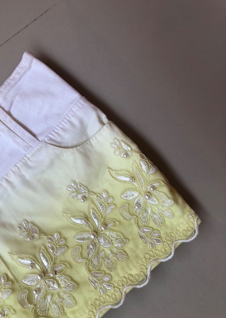 White and Yellow Gradient Embroidered Skort with Shorts Inside (Category: Skirts) located in Davao. Submitted by christ07_fox (Listing ID 1470047766, Image 2). Description: - Design: White to pastel yellow gradient skort with built-in white shorts - Details: Gorgeous floral embroidery and a trendy scalloped hem - Fit: High-waisted style with a convenient center zipper in the back - Style: Cute, versatile summer piece that pairs easily with any ba