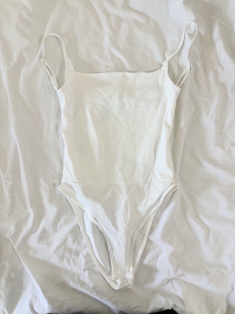 white backless crisscross bodysuit (Category: Sleeveless) located in Manila. Submitted by nicswhuut (Listing ID 1470118308, Image 1). Description: 📌can do lalamove (manila area only!) 📌j&t for outside manila 📌mop: gcash, maya, or metrobank 📌loc: sampaloc, manila 📌lp are posted UNLESS u r getting 2 or more items then i can give discount 🤗.