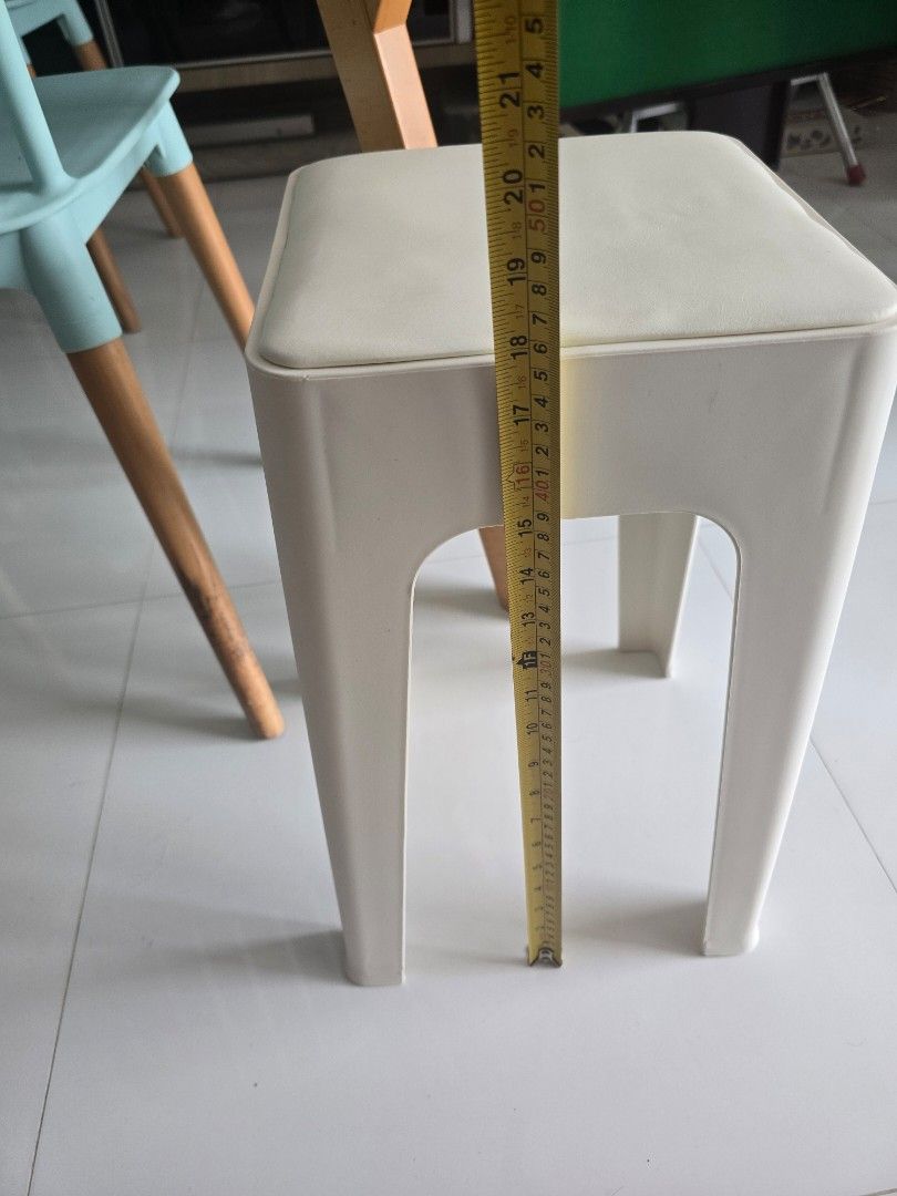 White cushioned stackable square stool (Category: Chairs) located in Singapore. Submitted by chermaine22 (Listing ID 1469998164, Image 2). Description: - Color & Material: white milky plastic frame with a padded cushion top - 25cmx25cmx46cm - Design: Space-saving, stackable, and fits easily under tables - this colour has been sold out in store - one dozen pieces - Ideal for: Compact living spaces, home offices, or extra guest seating 12×$4=$48.