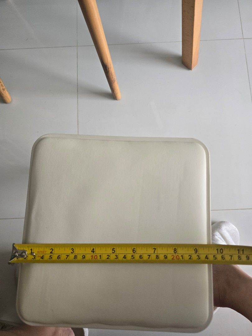 White cushioned stackable square stool (Category: Chairs) located in Singapore. Submitted by chermaine22 (Listing ID 1469998164, Image 3). Description: - Color & Material: white milky plastic frame with a padded cushion top - 25cmx25cmx46cm - Design: Space-saving, stackable, and fits easily under tables - this colour has been sold out in store - one dozen pieces - Ideal for: Compact living spaces, home offices, or extra guest seating 12×$4=$48.