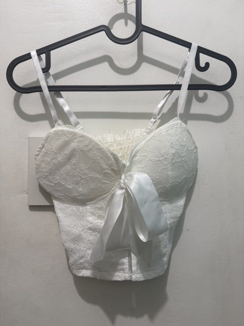 White Lace Crop Top with Satin Bow (Category: Sleeveless) located in Manila. Submitted by katsinlao (Listing ID 1470105308, Image 1). Description: Description: Size: Can fit from XS to S Condition: Like new, used once only Payment: - Payment first policy - Gcash - Maya - Gotyme - COD (if lalamove) - Cash if meet up .