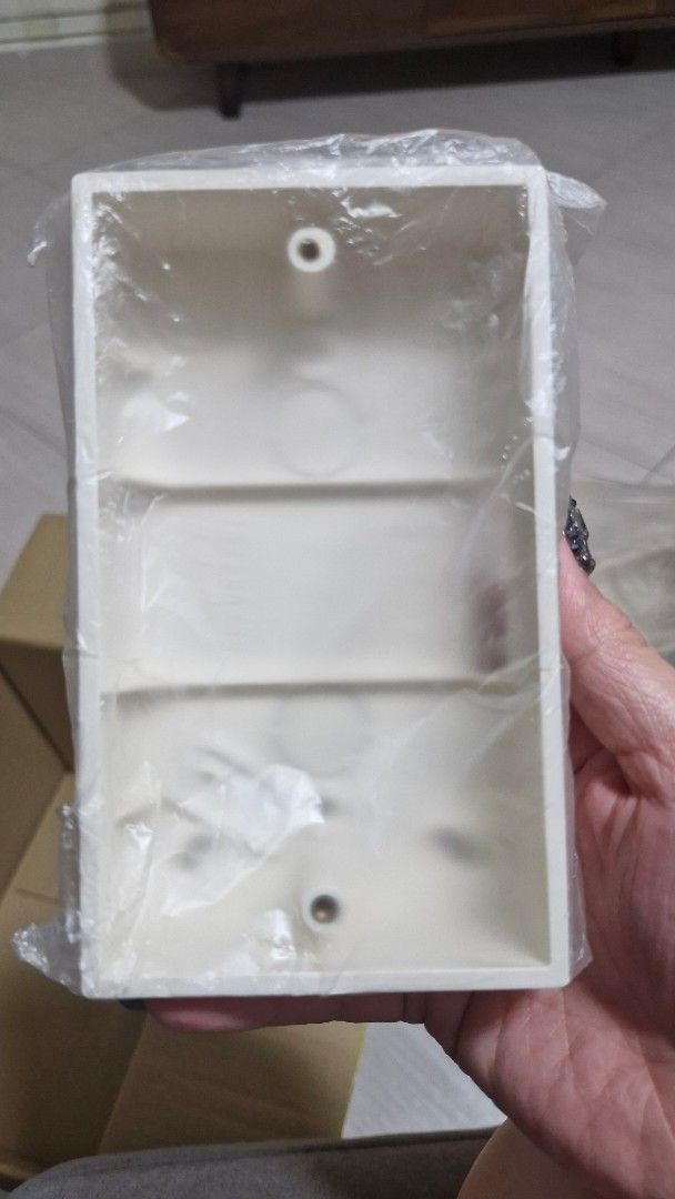 White surface mounting electrical switch socket box casing (Category: Electrical, Adaptors & Sockets) located in Singapore. Submitted by minimalist2000 (Listing ID 1470098593, Image 2). Description: - Brand new white plastic surface mounting box - Suitable for electrical switches and sockets - Still sealed in original clear plastic packaging - Size: 147x86x33 - Qty: 7pcs.