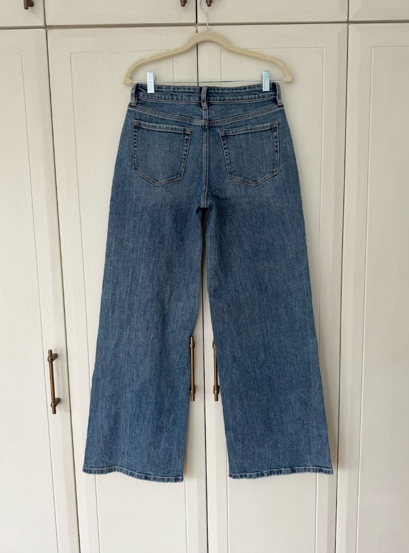Flying Monkey Wide Leg Denim Jeans (Category: Jeans) located in Makati City. Submitted by belizalde4 (Listing ID 1470010829, Image 3). Description: - Style: Wide leg denim jeans - Wash: Medium wash with faded finish on thighs - Rise: Mid-rise waist - Size: 26/27 - Closure: Standard button and zip - Pockets: Classic five-pocket style.