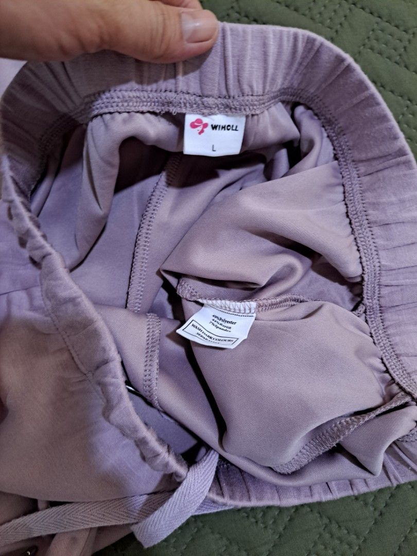 Wihooll Purple Lounge Pants Size L (Category: Jeans) located in Manila. Submitted by kayliz.7 (Listing ID 1470012062, Image 2). Description: - Brand: Wihooll - Size: Large - Color: Purple - Condition: Clean, brand new with tags intact inside the waistband - Material: Soft polyester, rayon, and spandex blend - Features: Elastic waistband with adjustable drawstring - Best for: Ultimate comfort at home or casual errands.