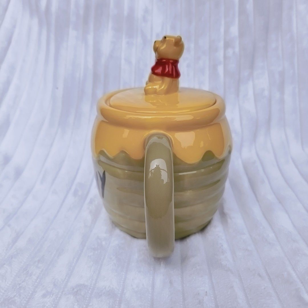WINNIE THE POOH MUG WITH LID (Category: Coffee & Tea Tableware) located in Bontoc. Submitted by shaneebhee (Listing ID 1469958537, Image 3). Description: 💛 WINNIE THE POOH MUG WITH LID 💛 💰 ₱750.oo ✅ Available on hand 📦 Ready to ship ✨ No cracks, chips, or crazing! 📍 Bontoc, Mt. Province 💚 GCash payment only 📦 Nationwide shipping via J&T Express 🕰️ Luzon: 2–3 days | VisMin: 3–7 days 🚚 Shipping fee c/o buyer ❌ No COD — payment first po..