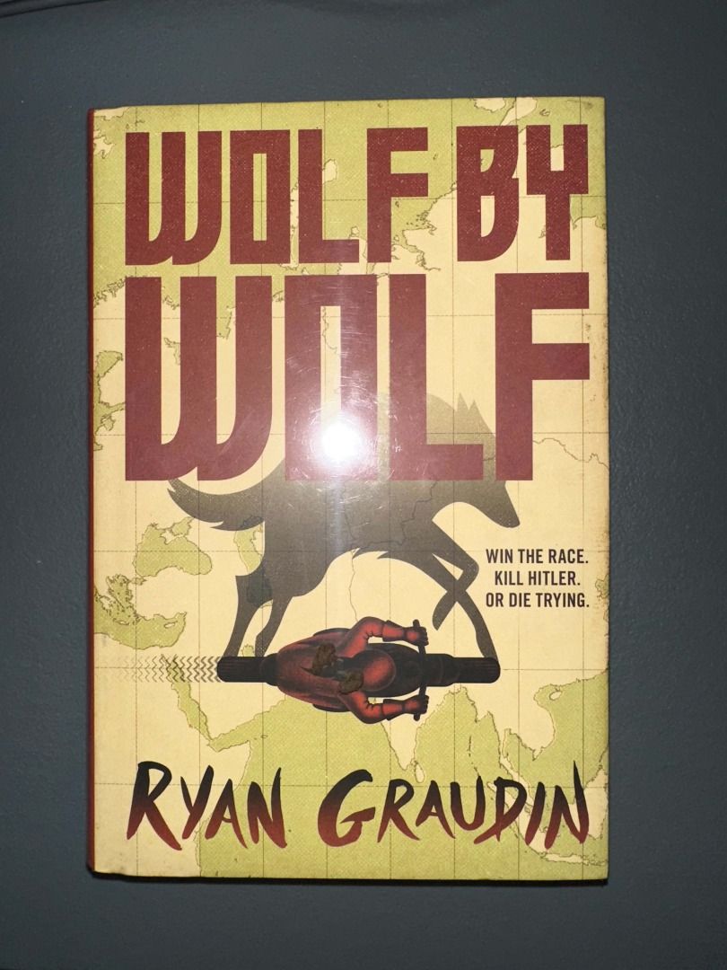Wolf by Wolf by Ryan Graudin HARDCOVER (Category: Storybooks) located in Caloocan City. Submitted by mae2551 (Listing ID 1470084298, Image 1). Description: - Title: Wolf by Wolf - Author: Ryan Graudin - Genre: YA thriller, historical fiction - Format: Hardcover - Condition: Partly sealed in original plastic, some brown spots on page edge. Video of condition available on request..