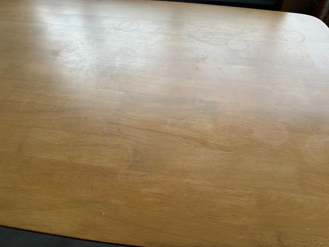Wooden Dining Table Rectangular Table (Category: Tables & Sets) located in Singapore. Submitted by shopmonmon (Listing ID 1469985840, Image 3). Description: - Type: Rectangular wooden dining table - 135cm (L) x 81cm (B) x 76cm (H) - Bought at $650 - Well-used, with some water stains but table is still highly functional and stable. - Letting go as we need longer table for growing family. Otherwise would have loved to keep this. - Design: Rounded c