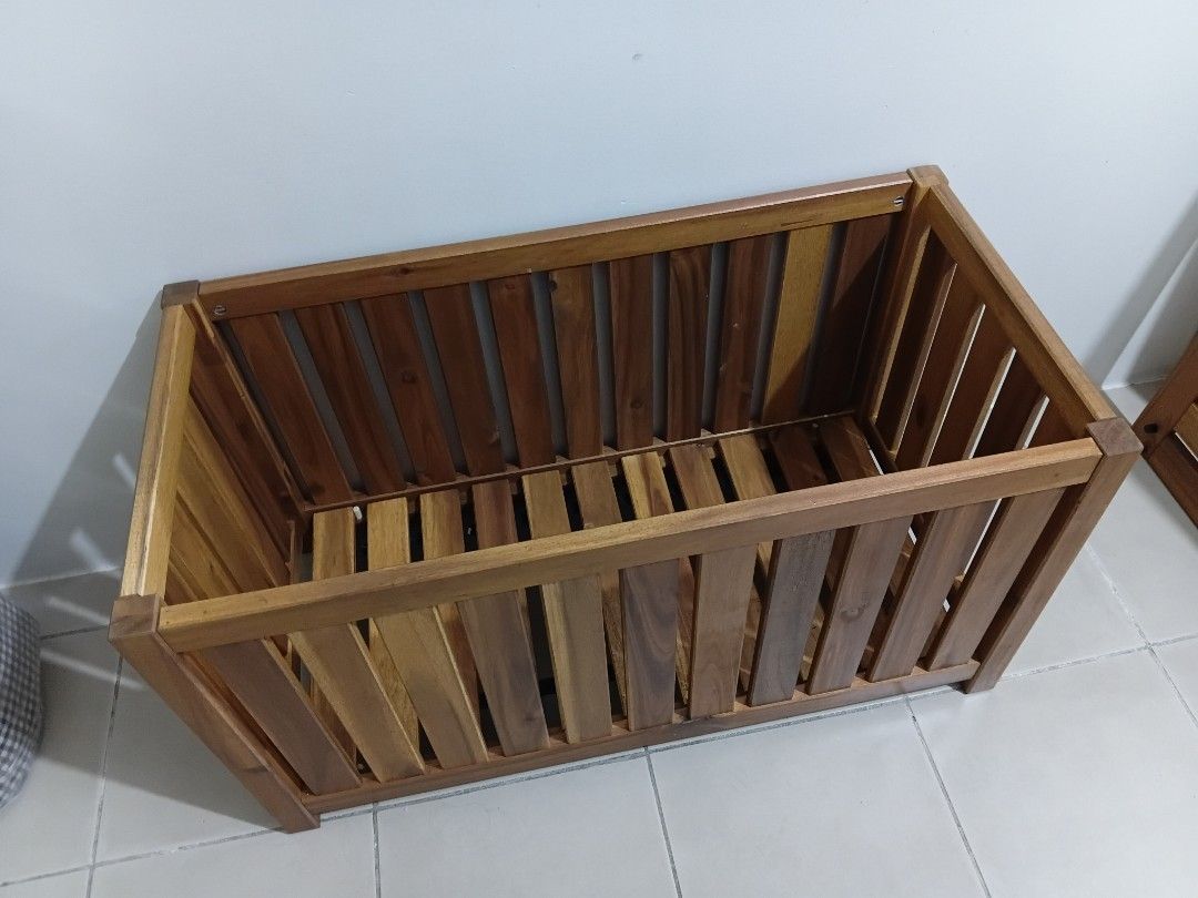 Wooden slat storage box chest with lid (Category: Storage Boxes & Baskets) located in Makati City. Submitted by mkdmaniego (Listing ID 1470102011, Image 3). Description: - Material: Sturdy solid wood with a warm brown finish - Design: Slatted structure for continuous airflow - Features: Includes a matching removable lid - Best For: Organizing blankets, toys, shoes, or entryway essentials from Ikea.