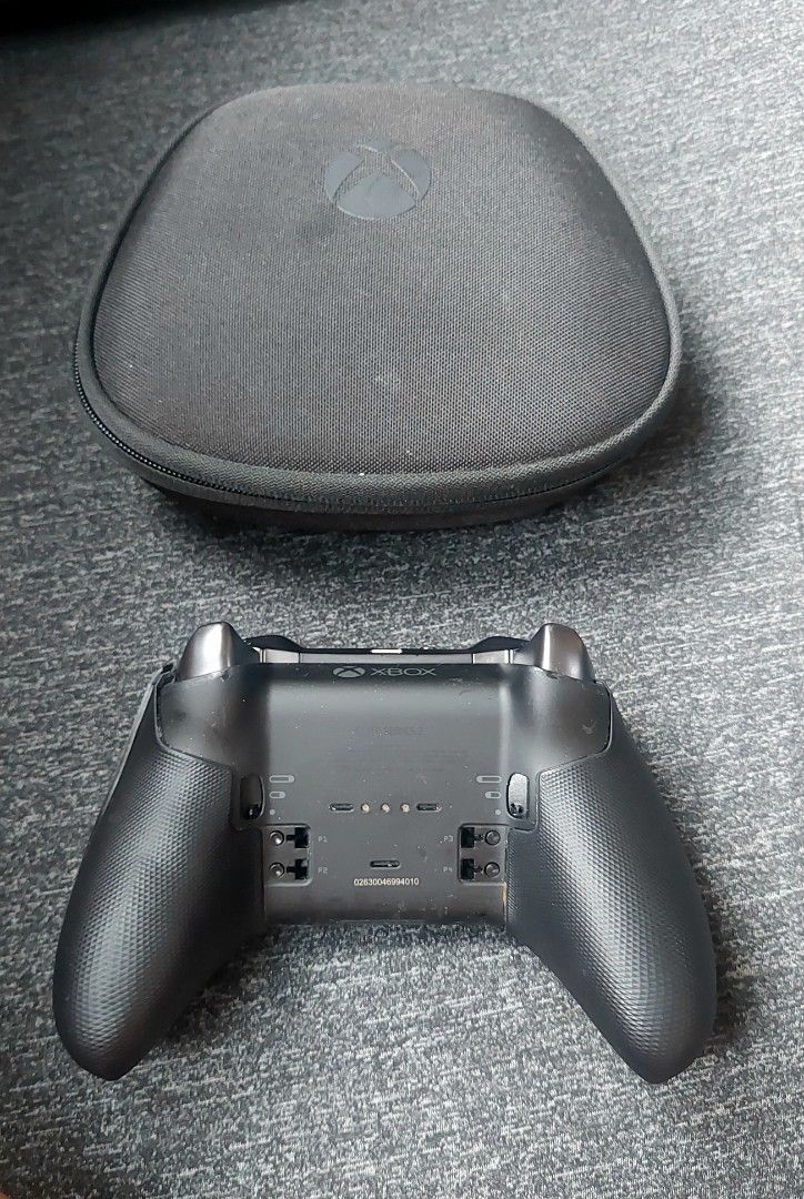 Xbox Elite Wireless Controller Series 2 Black with Case and Accessories (Category: Controllers) located in Makati City. Submitted by kamotejoe (Listing ID 1469982346, Image 3). Description: selling: Black Xbox Elite Wireless Controller Series 2 for 3000 Includes: Controller case charging dock 3 paddles 3 joysticks cross directional button price is fixed Condition: - Needs faceplate replacement, - Left stick sometimes get stuck -Missing 1 paddle, 