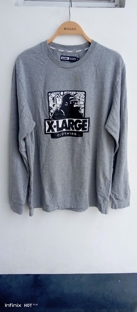 X-Large Grey Long Sleeve Tee Gorilla Graphic (Category: Tshirts & Polo Shirts ) located in Manila. Submitted by rhegsthrifted (Listing ID 1470065739, Image 1). Description: - Brand: X-Large - Color: Grey - Size: Large - Dimes: Width - 21 x Length - 28 - Material: 100% Cotton - Fit: Standard fit with crew neck - Details: Large chest gorilla graphic and 'X-Large Gon' Give It To Ya Since '91' back print - Condition: Great casual streetwear piece - I