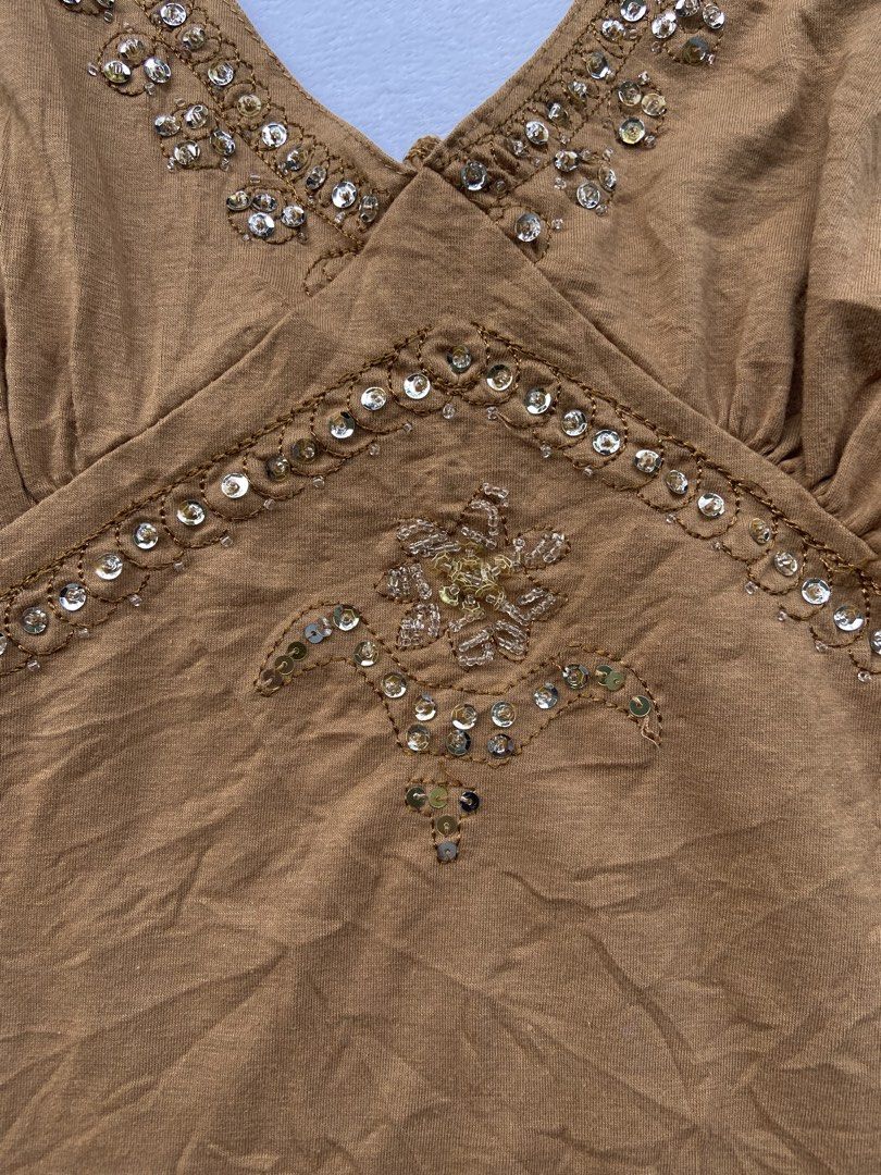 Y2K Beaded Cami Tops, so.fu.na (Category: Blouses) located in General Santos City (Dadiangas). Submitted by kala_chuchi (Listing ID 1470110413, Image 3). Description: Size. Small 13 inches width 23 inches length No flaws Over all condition Excellent .
