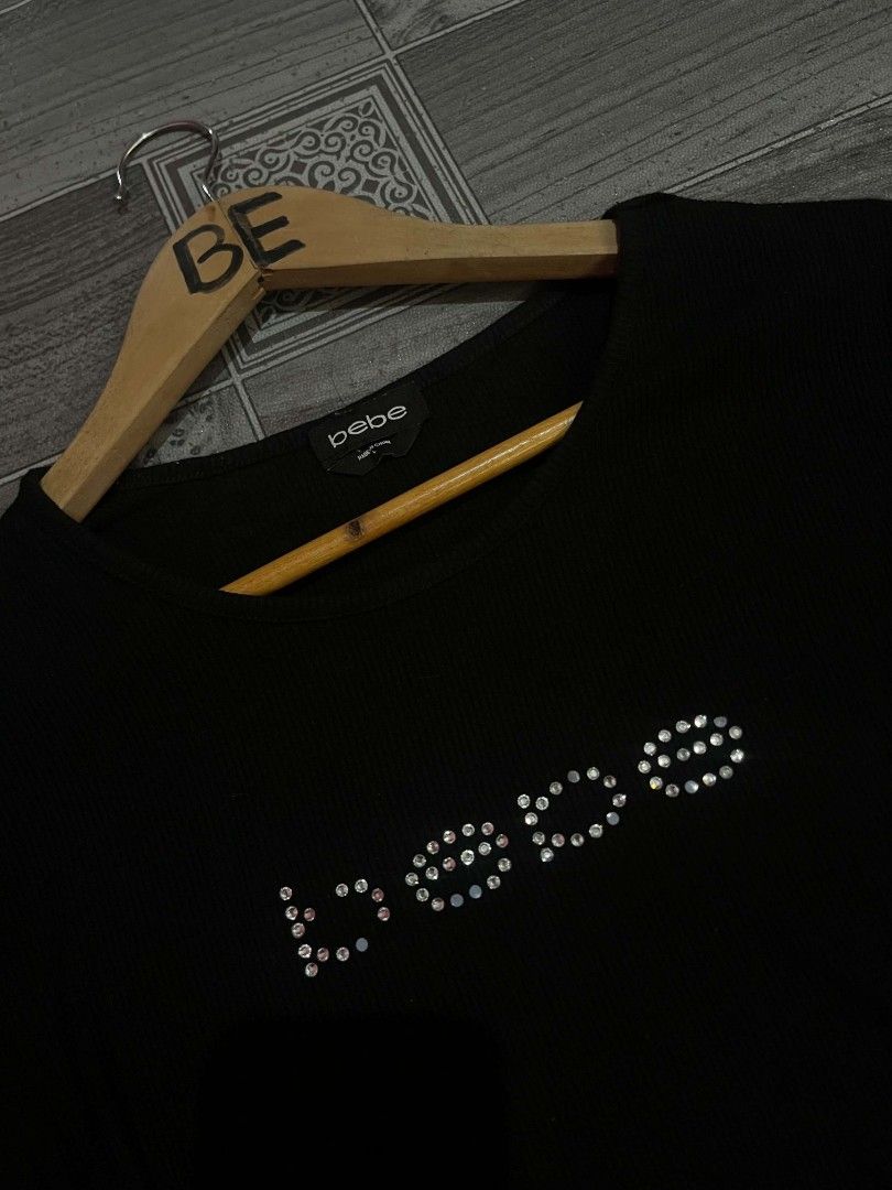 Y2k Bebe Rhinestone Ribbed Shirt (Category: Blouses) located in Polomolok. Submitted by olaivarmanuel4-57684 (Listing ID 1470057072, Image 2). Description: Bebe Rhinestone Ribbed Shirt Size Large ( Best fit Medium to Large See pic. for details 299 pesos only 🏷️.