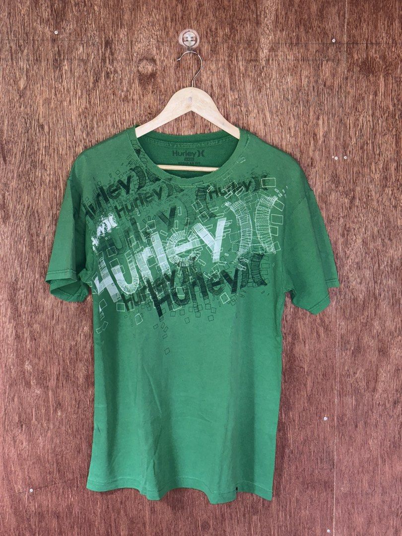 Y2k Hurley Green T-shirt (Category: Tshirts & Polo Shirts ) located in Cabuyao City. Submitted by giothr1ft (Listing ID 1470079124, Image 1). Description: -Width: 22 -Length: 29 -Condition: 10/10 📌Buyers will shoulder the shipping fee.