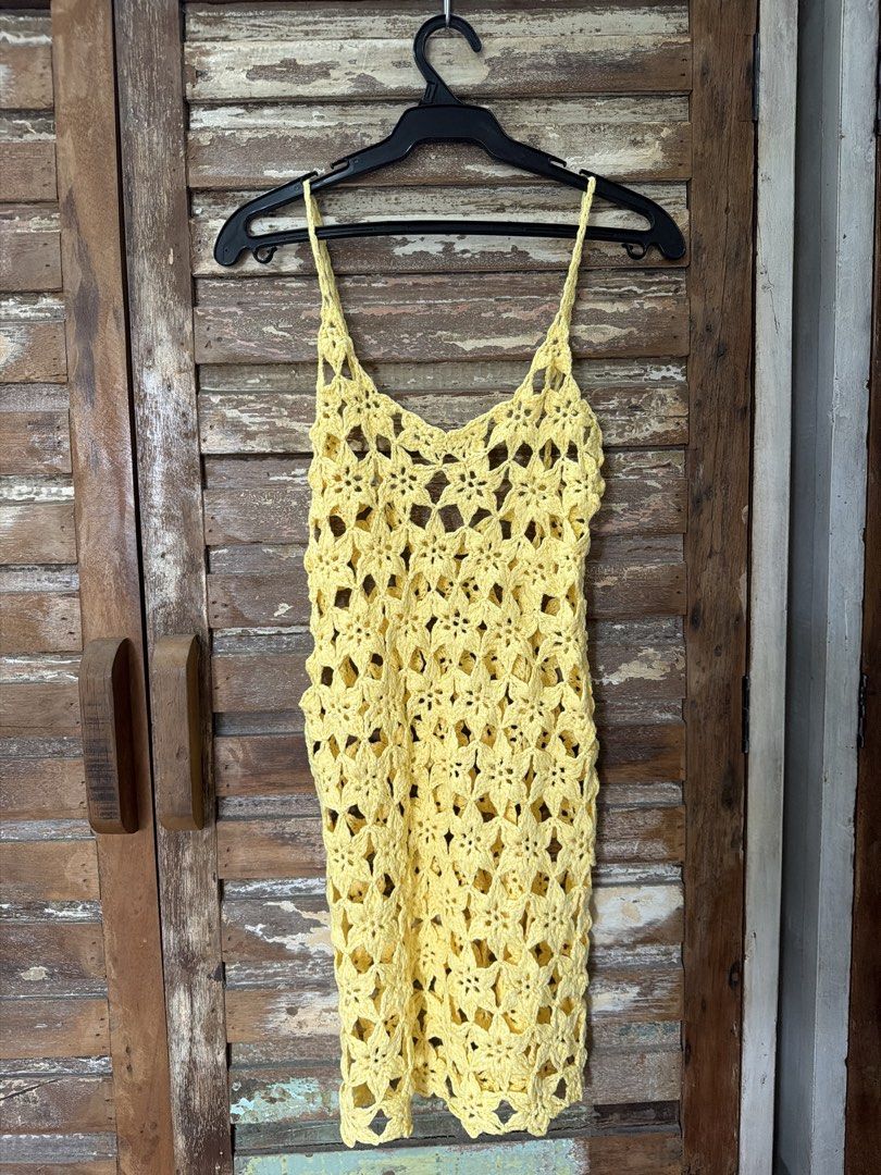 Yellow Crochet Dress Sleeveless Mini (Category: Dresses) located in Manila. Submitted by cb_____ (Listing ID 1469970147, Image 1). Description: - Color: Bright yellow - Style: Mini dress / beach cover-up - Details: Spaghetti straps, V-neckline - Design: All-over floral open-knit pattern - Material: Lightweight, stretchy yarn (unlined sheer construction).