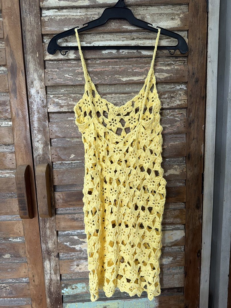 Yellow Crochet Dress Sleeveless Mini (Category: Dresses) located in Manila. Submitted by cb_____ (Listing ID 1469970147, Image 2). Description: - Color: Bright yellow - Style: Mini dress / beach cover-up - Details: Spaghetti straps, V-neckline - Design: All-over floral open-knit pattern - Material: Lightweight, stretchy yarn (unlined sheer construction).