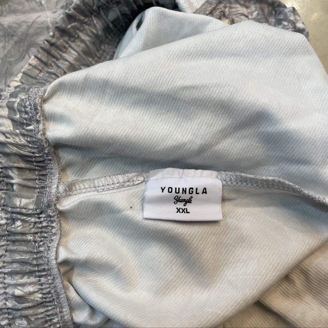 YoungLA Tree Camo Baggy Sweat pants (Category: Trousers) located in Iloilo. Submitted by nextwearco_ilo (Listing ID 1469999055, Image 3). Description: YoungLA Tree Camo Baggy Sweat pants • Like new condition • 30-40 W x 42 L • 10.5 Leg opening • No flaws - cut washtag ₱ 1.8k Dm.