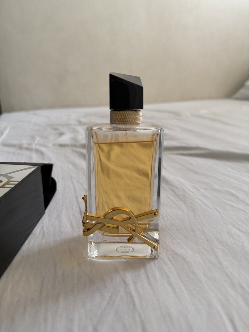 Yves Saint Laurent Libre Eau de Parfum 90ml (Category: Fragrance & Deodorants) located in Quezon City. Submitted by rej_lawig (Listing ID 1470025103, Image 1). Description: - Authentic Yves Saint Laurent Libre Eau de Parfum - Size: 90ml / 3 fl oz - Luxurious gold YSL hardware wrapping the glass bottle - Chic black asymmetrical cap - Original box included - 100% genuine and well-kept - Ships securely from a trusted seller.