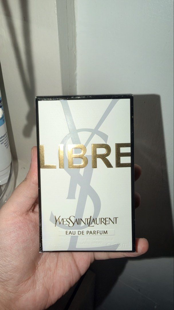 Yves Saint Laurent Libre Eau De Parfum 30ml (Category: Fragrance & Deodorants) located in Magalang. Submitted by josephinenl (Listing ID 1470098361, Image 1). Description: Bought in AU. I still have the copy of the receipt. Sprayed around 3-4 times only. YSL Libre Eau de Parfum, 30ml bottle. Iconic oversized gold Cassandre logo wrapping the glass. Asymmetric black cap with gold chain detailing around the neck. Warm floral fragrance with lavender 