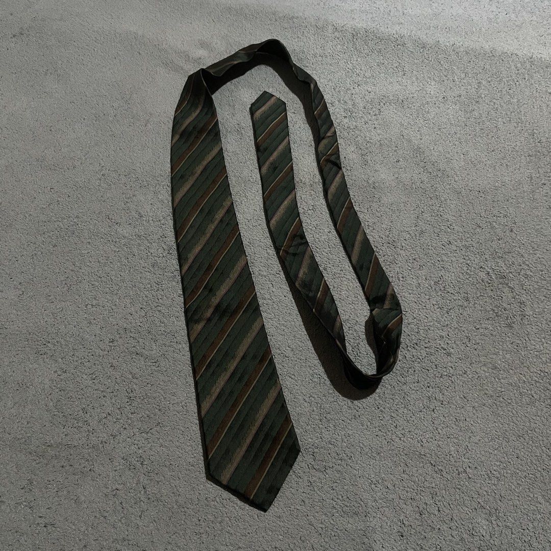 Yves Saint Laurent Neck Tie (Category: Luxury Accessories) located in Hagonoy. Submitted by ianthrift_ph (Listing ID 1470093386, Image 1). Description: complete tags/authentic pristine condition color rate 10/10 no issue .
