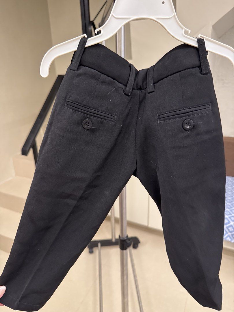 Zanetti Black Trousers Size M (Category: Babies & Kids Fashion) located in Manila. Submitted by __nix (Listing ID 1470019938, Image 2). Description: - Brand: Zanetti - Size: M - Color: Classic Black - Features: Belt loops, front pockets, button-closure back pockets - Special Detail: Striped inner waistband lining - Style: Versatile staple for smart casual or formal outfits - Matching: Easy to pair with shirts and blazers.
