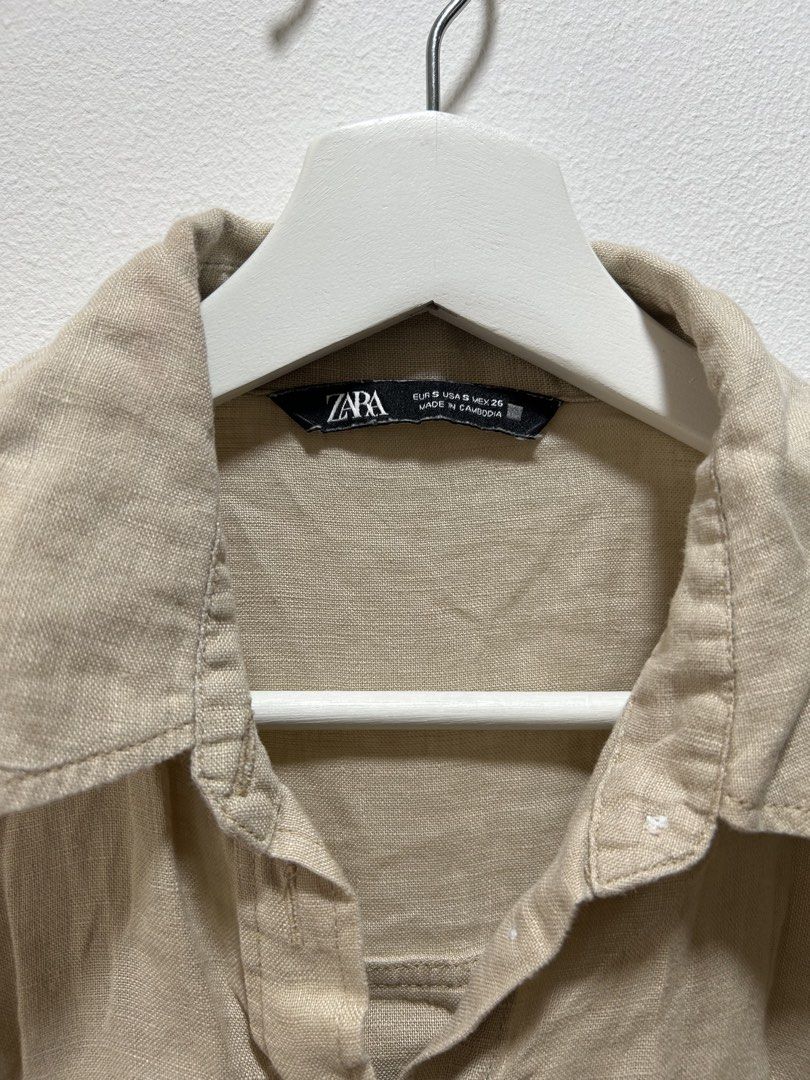 ZARA Beige Linen Long Sleeve Button-Down Shirt (Category: Longsleeves) located in Manila. Submitted by isabelle_1104 (Listing ID 1470026599, Image 3). Description: ZARA linen button-down shirt in beige. Classic collar, front button closure, single chest pocket. Long sleeves with button cuffs. Relaxed fit with a pleated back yoke detail. Lightweight and breathable fabric, great for layering or casual wear. Size S as indicated on the inner collar l