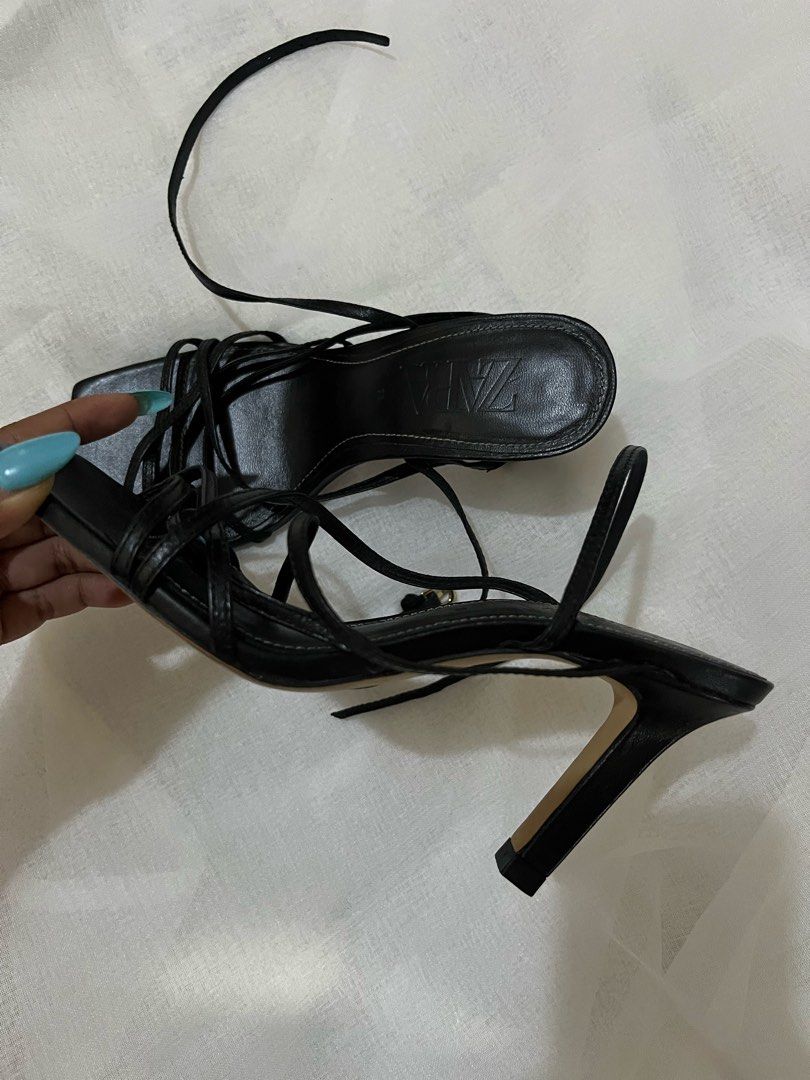 Zara black strappy square toe heels (Category: Heels) located in Bago City. Submitted by yanna_0932 (Listing ID 1469986000, Image 2). Description: - Brand: Zara - Color: Black - Style: Square toe with strappy wrap-around details - Size: 35-36 - Condition: Very good (worn only twice) - Reason for selling: Too small - Note: Super nice and flattering in actual wear!.