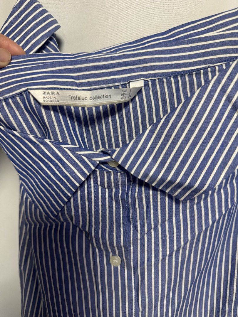 Zara Blue White Striped Off Shoulder Blouse (Category: Blouses) located in Calamba. Submitted by cheriiv (Listing ID 1469952869, Image 3). Description: Small stain on sleeve, see last photo.