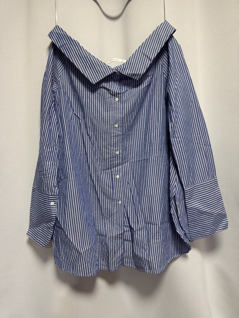 Zara Blue White Striped Off Shoulder Blouse (Category: Blouses) located in Calamba. Submitted by cheriiv (Listing ID 1469952869, Image 2). Description: Small stain on sleeve, see last photo.