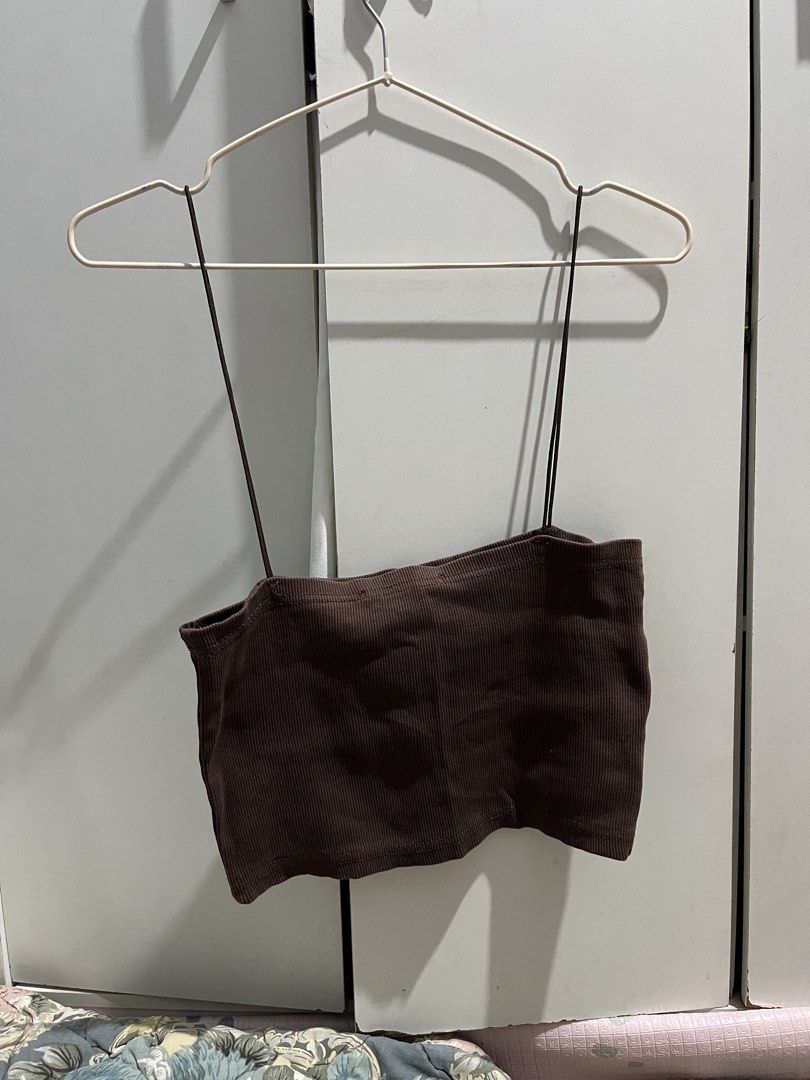 ZARA Brown Ribbed Spaghetti Strap Crop Top (Category: Sleeveless) located in Caloocan City. Submitted by decluttering.101_ (Listing ID 1470006860, Image 1). Description: - Brand: ZARA - Item: Brown ribbed crop top with thin spaghetti straps - Size: XL on tag - Fit: Stretchy, super comfortable, and easy to match with high-waisted bottoms - Condition: Worn a few times, still in solid shape.