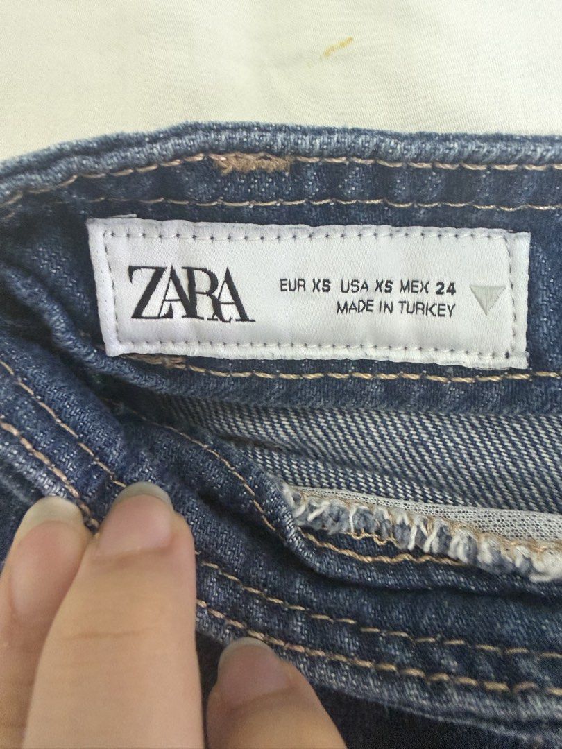Zara denim cargo mini skirt size XS (Category: Skirts) located in Manila. Submitted by peacd (Listing ID 1470029481, Image 2). Description: - Brand: Zara - Style: Dark blue denim mini skirt - Fit: Low-rise - Size: EUR XS / USA XS / MEX 24 - Length: Approx. 14.5 inches - Feature: Structured utility pocket on the front.